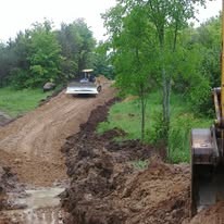 Professional site grading with heavy equipment in Grey County Ontario