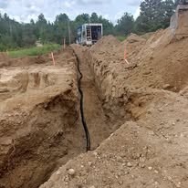Tile field installation and drainage trenching in Grey County Ontario
